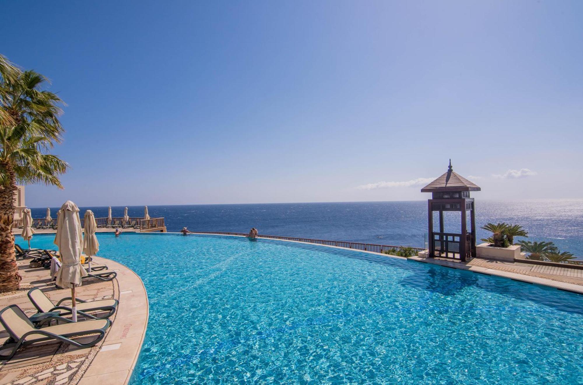Reef Oasis Blue Bay Resort & Spa Sharm el-Sheikh Exterior foto Infinity pool at the Grand Resort